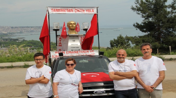 Aracının üstüne Atatürk büstü koydu!