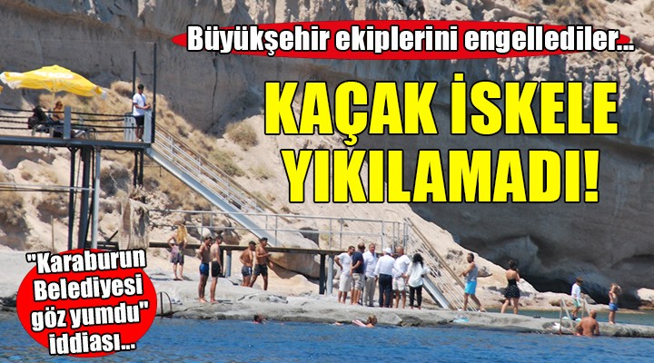 Ayıbalığı Koyu'nda İzmir Büyükşehir ekiplerini engellediler... KAÇAK İSKELE YIKILAMADI!