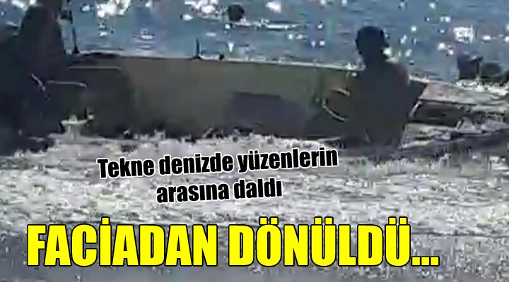 İzmir'de faciadan dönüldü.. Tekne denizde yüzenlerin arasına daldı!