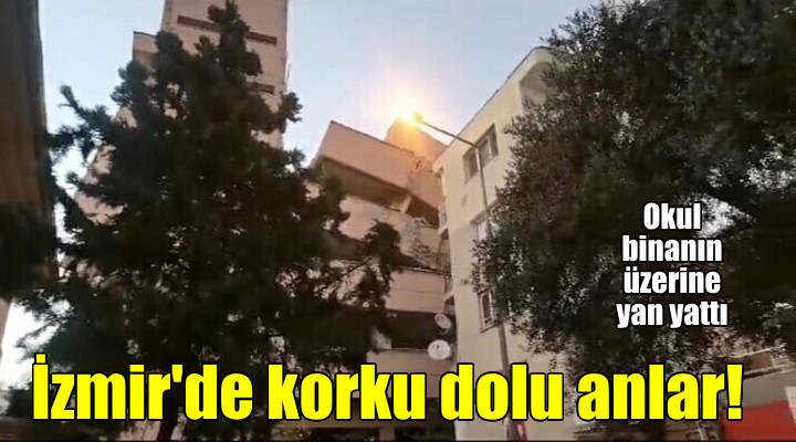İzmir'de korkulu anlar... Okul binası apartmanın üzerine yan yattı!