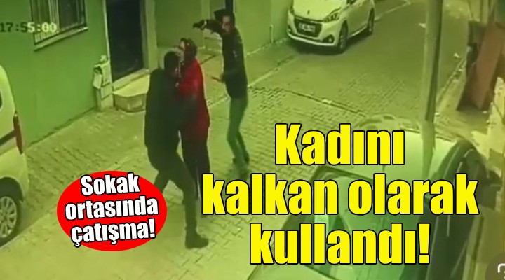İzmir'de sokak ortasında çatışma... Kadını kalkan olarak kullandı!