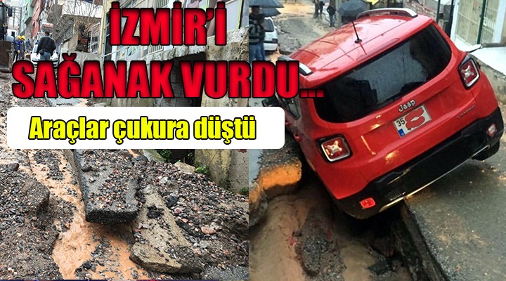 İzmir'i sağanak vurdu... Araçlar çukura düştü!
