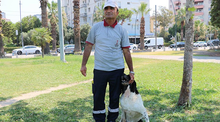 Temizlik görevlisi ile sokak köpeğinin dostluğu..